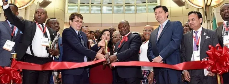 Ribbon-cutting ceremony with leadership and government officials