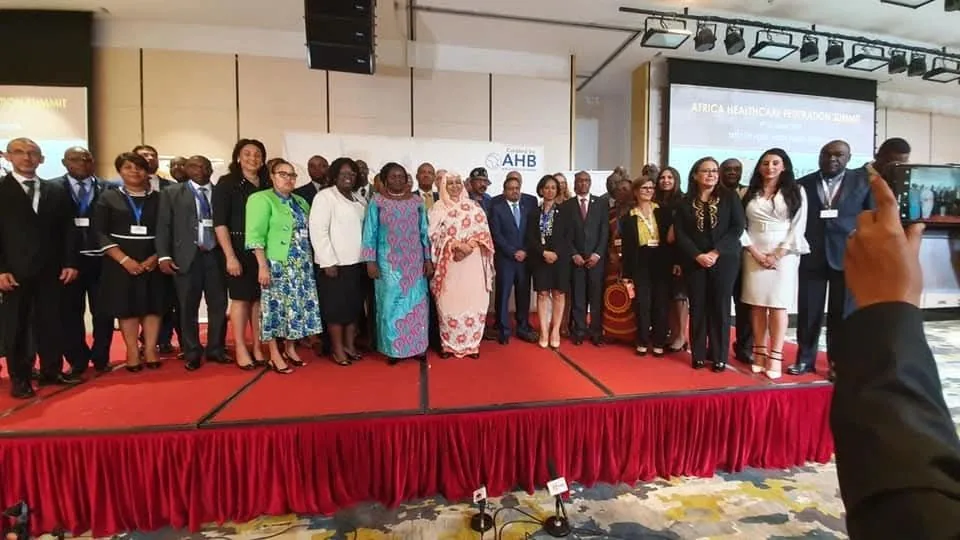 Ministers, heads of delegation and healthcare federation leaders on stage at the Africa Healthcare Federation Summit, Addis Ababa, 2019, with Sarah Zineb Boumouja