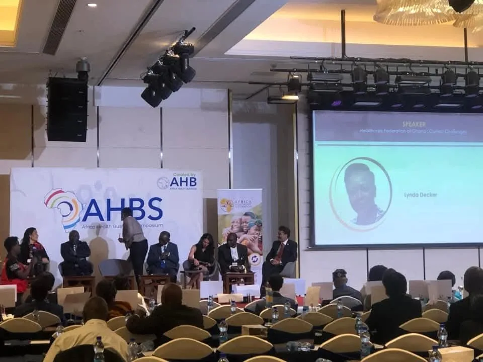Sarah Zineb Boumouja facilitating the session on stage with Dr. Amit N. Thakker, ministers of health and healthcare federation leaders, AHBS IV, Addis Ababa 2019