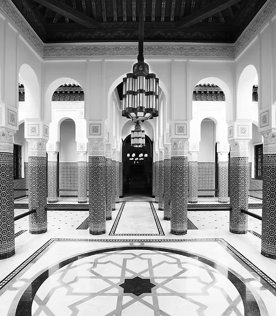 Interior courtyard of La Mamounia, Marrakech, with zellige columns and lanterns